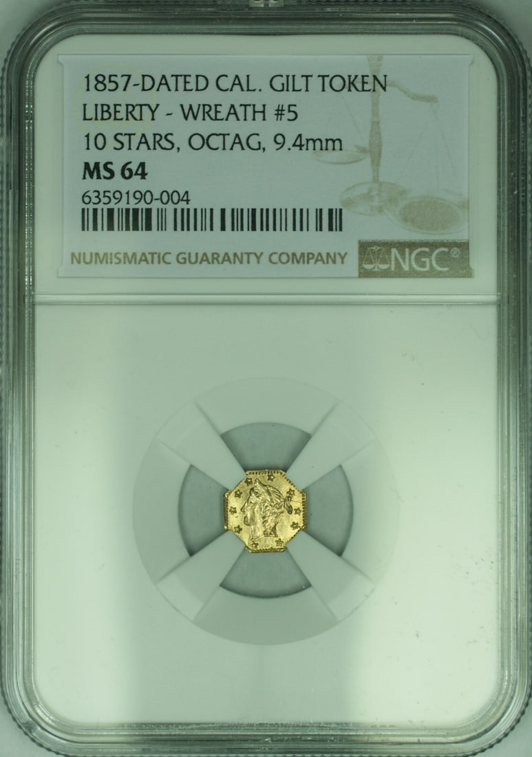 1857 California Gold Token Liberty Wreath 10 Stars Octagon 9.4MM NGC MS 64: 1857 California Gold Token Liberty Wreath 10 Stars Octagon 9.4MM NGC MS 64 This 1857 California gilt token features a Liberty design with Wreath #5 and 10 stars. The token is octagonal in shape and me