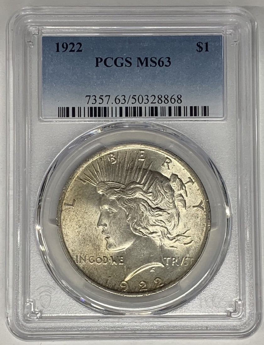 PCGS MS 63 1922 Peace Dollar Silver Coin Light Toning: PCGS MS 63 1922 Peace Dollar Silver Coin Light Toning This is a 1922 Peace Silver Dollar coin from the United States, featuring a lightly toned finish. The coin is uncirculated and has been graded MS