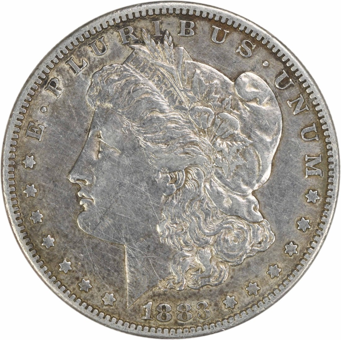 1883 San Francisco Morgan Dollar EF Grade 90 Percent Silver Uncertified: 1883 San Francisco Morgan Dollar EF Grade 90 Percent Silver Uncertified This 1883-S Morgan Silver Dollar is a circulated coin from the United States, minted in San Francisco. Composed of 90% silver an