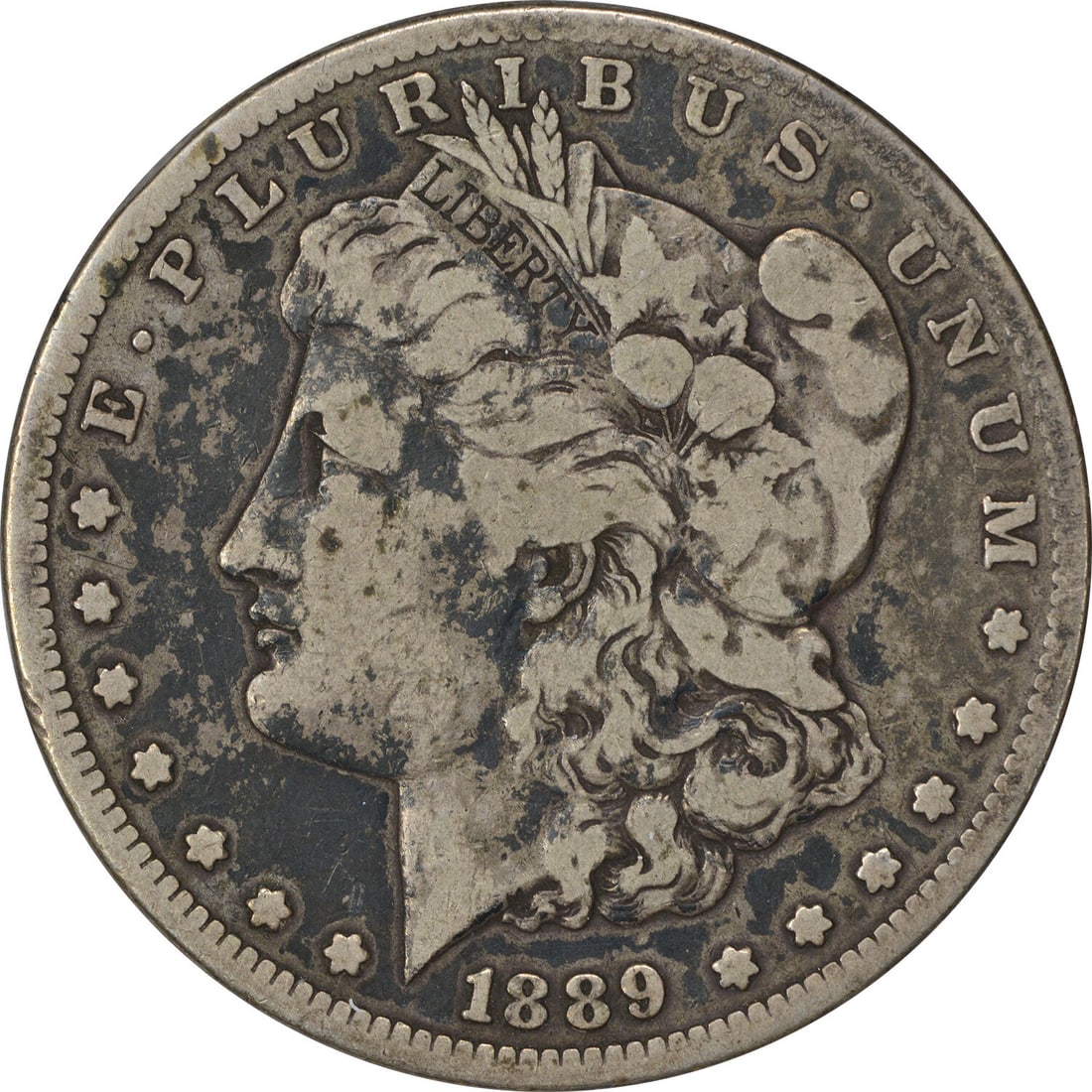 1889-CC Morgan Silver Dollar Coin by George T. Morgan: 1889-CC Morgan Silver Dollar Coin by George T. Morgan This 1889-CC Morgan Silver Dollar is a remarkable piece of history, featuring a striking design by George T. Morgan. The coin is made of 90% silve