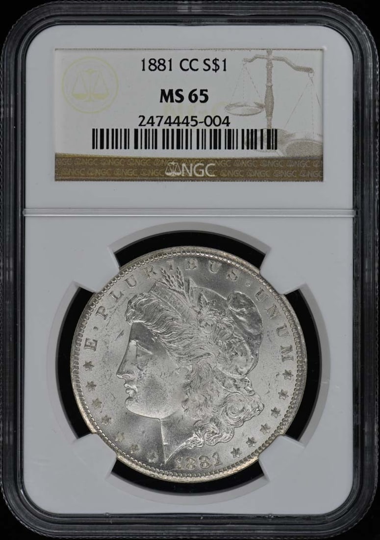 1881 Carson City Morgan Dollar NGC MS65 Uncirculated: 1881 Carson City Morgan Dollar NGC MS65 Uncirculated This stunning 1881-CC Morgan Dollar, certified by NGC with a grade of MS65, showcases the exceptional quality and detail of this iconic coin. Struc