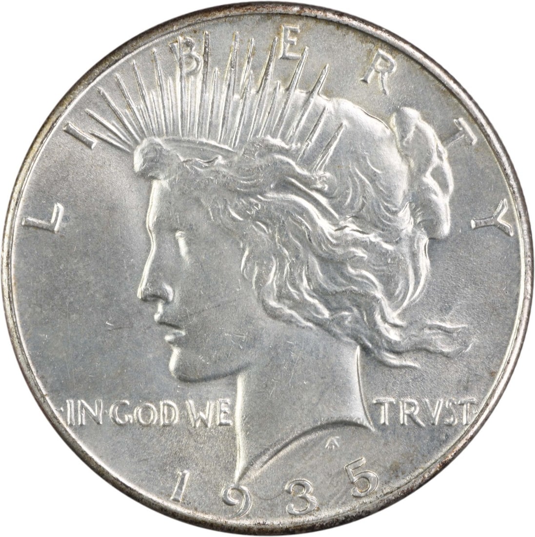 1935 Peace Silver Dollar AU Uncertified 90% Silver Philadelphia Mint: 1935 Peace Silver Dollar AU Uncertified 90% Silver Philadelphia Mint This 1935 Peace Silver Dollar is a beautifully circulated coin with an attractive AU (Almost Uncirculated) grade. Minted in Philade