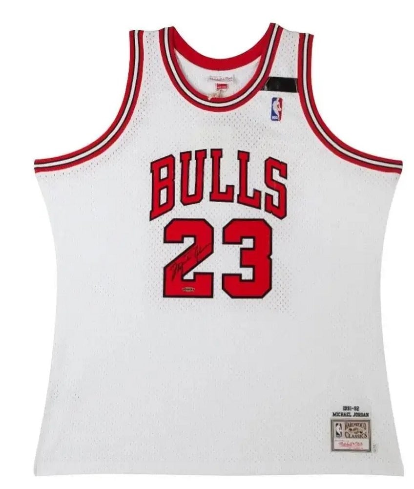Michael Jordan Autographed 1992 Mitchell & Ness Bulls Jersey Upper Deck Authenticated: Michael Jordan Autographed 1992 Mitchell & Ness Bulls Jersey Upper Deck Authenticated Celebrate the legacy of basketball legend Michael Jordan with this autographed Chicago Bulls jersey. This original