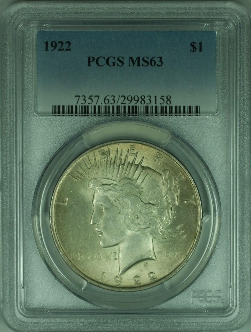 PCGS MS63 1922 Peace Dollar Silver Coin with Light Toning: PCGS MS63 1922 Peace Dollar Silver Coin with Light Toning This 1922 Peace Silver Dollar is an uncirculated $1 coin certified by PCGS with a grade of MS 63. Minted in Philadelphia, it features light to