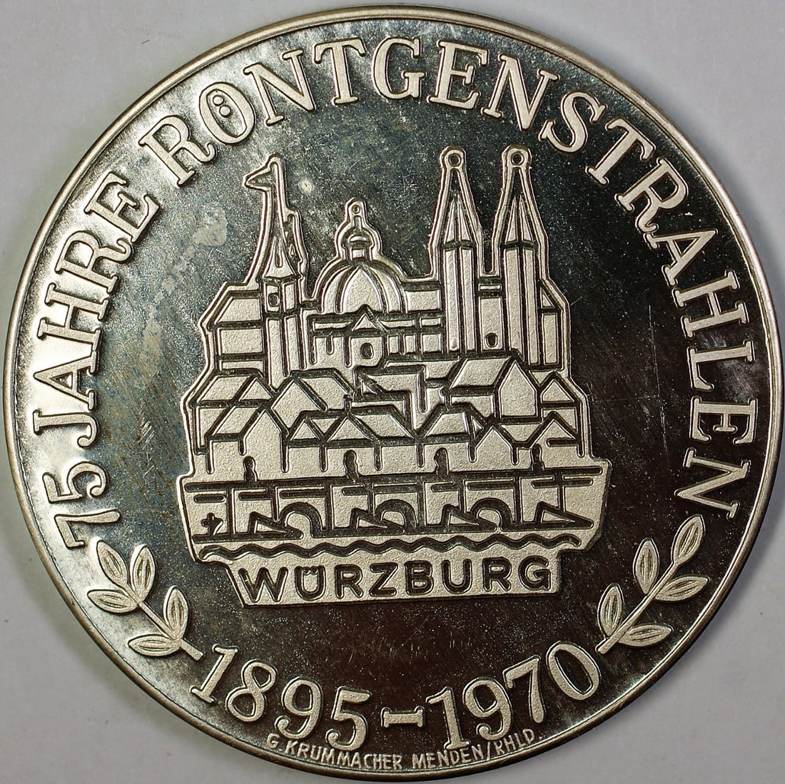 German Silver Medal 75th Anniversary Rontgenstrahlen 1895-1970 BU: German Silver Medal 75th Anniversary Rontgenstrahlen 1895-1970 BU This commemorative silver medal celebrates the 75th anniversary of German State Rontgenstrahlen Conrad, marking the years 1895 to 1970