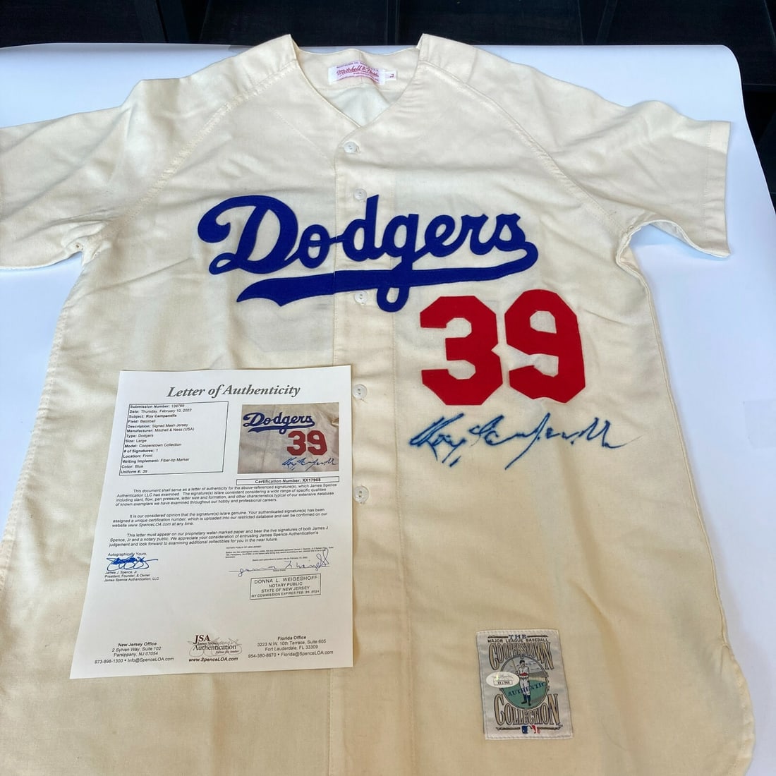 Roy Campanella Signed Brooklyn Dodgers Game Jersey with JSA COA: Roy Campanella Signed Brooklyn Dodgers Game Jersey with JSA COA This authentic game model jersey is a rare collectible featuring the signature of Roy Campanella, a legendary player of the Brooklyn Dod