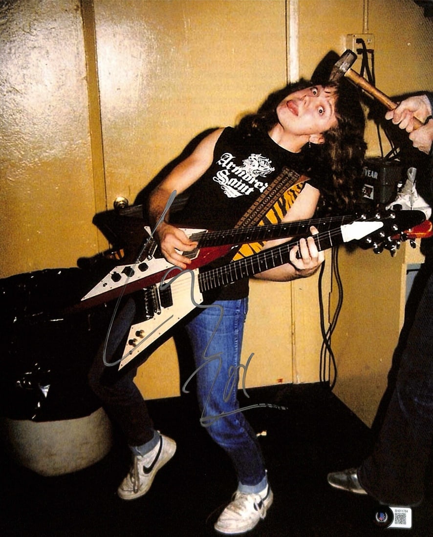 Lars Ulrich Signed 11x14 Metallica Photo Beckett Certified: Lars Ulrich Signed 11x14 Metallica Photo Beckett Certified This autographed 11x14 photograph features Lars Ulrich, the drummer and co-founder of Metallica, who has signed it in silver permanent marker