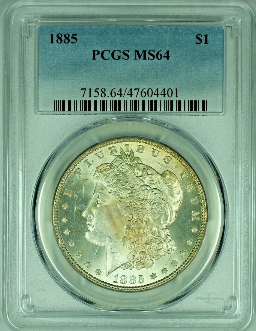 PCGS MS 64 Certified 1885 Morgan Dollar Silver Coin: PCGS MS 64 Certified 1885 Morgan Dollar Silver Coin This 1885 Morgan Silver Dollar is certified by PCGS with a grade of MS 64. The coin is uncirculated and composed of silver, originating from the Uni