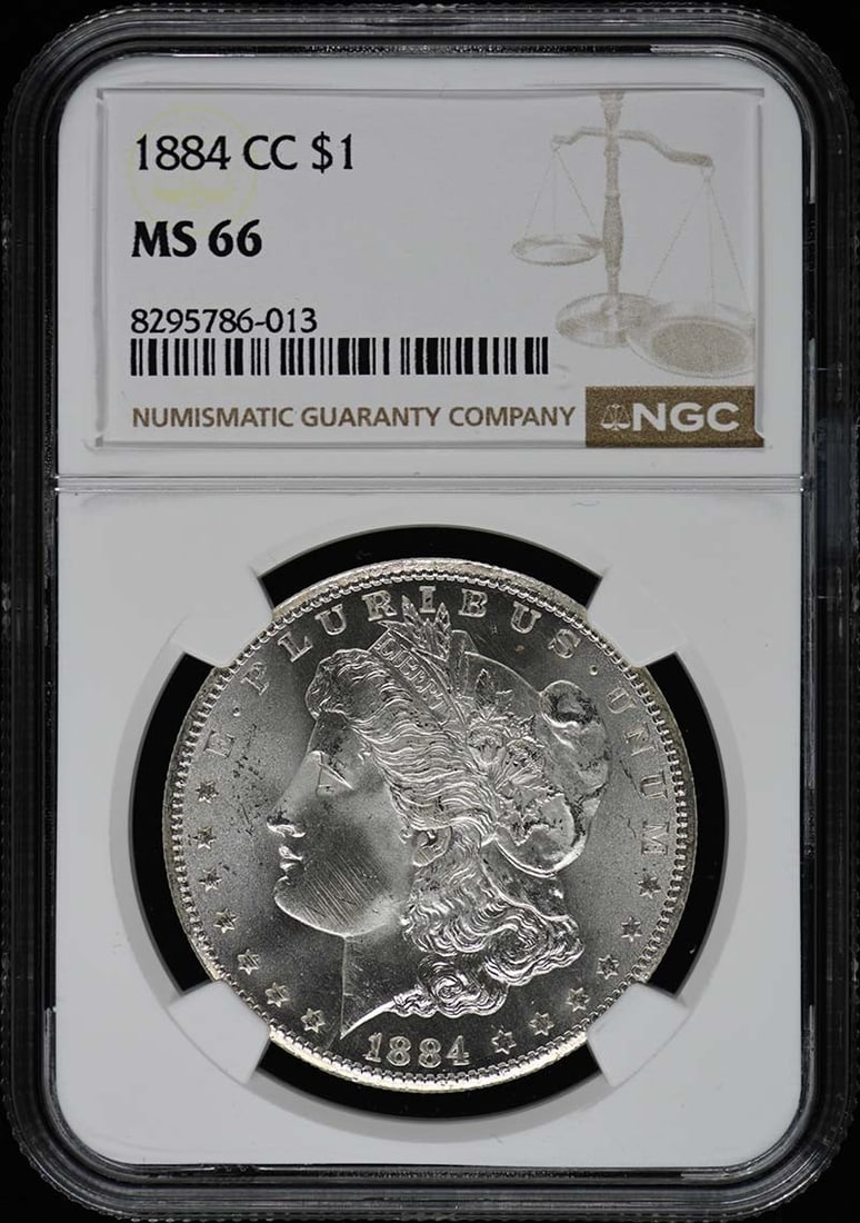 1884-CC NGC MS66 Uncirculated Morgan Dollar Coin: 1884-CC NGC MS66 Uncirculated Morgan Dollar Coin This 1884-CC Morgan Dollar is a stunning example of American numismatic history. Certified by NGC with a grade of MS66, this uncirculated coin showcase