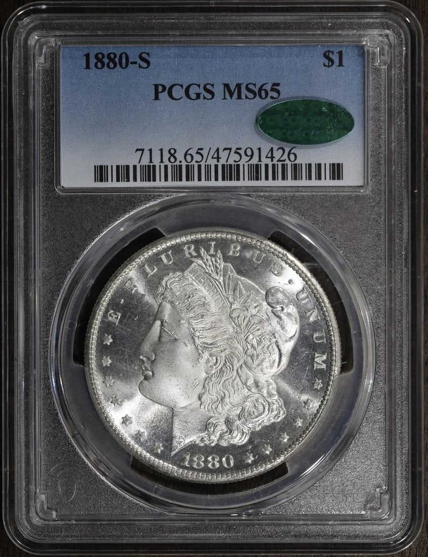 1880-S Morgan Silver Dollar MS65 CAC PCGS Uncirculated: 1880-S Morgan Silver Dollar MS65 CAC PCGS Uncirculated This 1880-S Morgan Silver Dollar is a stunning uncirculated piece, graded MS 65 by PCGS and featuring a CAC designation. Struck in 1880 at the Sa