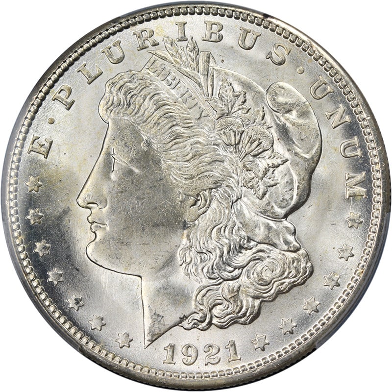 PCGS MS64 1921-S Morgan Dollar Silver Coin with Brilliant Luster: PCGS MS64 1921-S Morgan Dollar Silver Coin with Brilliant Luster This 1921-S Morgan Silver Dollar is graded PCGS MS64 and features a blast white appearance with superb eye appeal. It displays fantasti