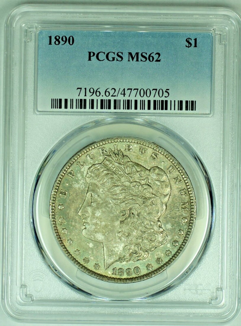 PCGS MS 62 Plus 1890 Morgan Silver Dollar Toned Uncirculated Coin: PCGS MS 62 Plus 1890 Morgan Silver Dollar Toned Uncirculated Coin This 1890 Morgan Silver Dollar is a toned coin graded MS 62+ by PCGS. It is uncirculated and features the classic Morgan design. Certi