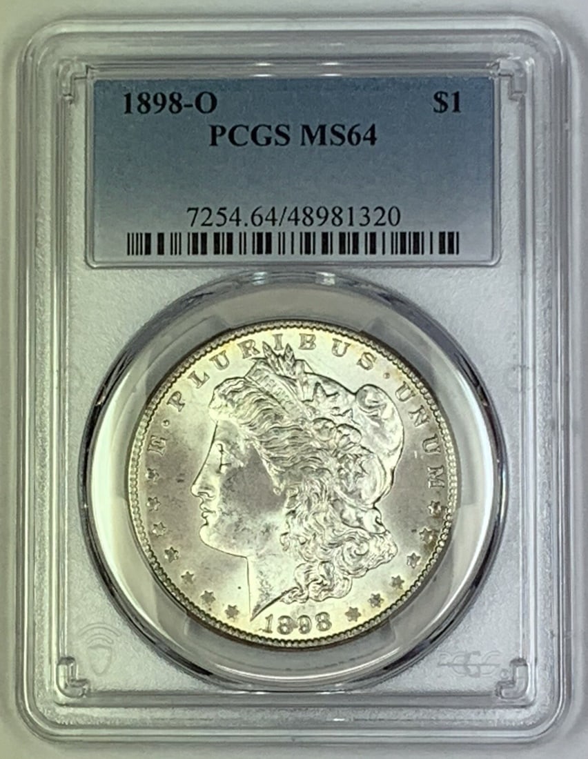 PCGS MS 64 1898-O Morgan Silver Dollar Uncirculated Coin: PCGS MS 64 1898-O Morgan Silver Dollar Uncirculated Coin This is an 1898-O Morgan Silver Dollar, graded MS 64 by PCGS. The coin is composed of silver, remains uncirculated, and originates from the Uni