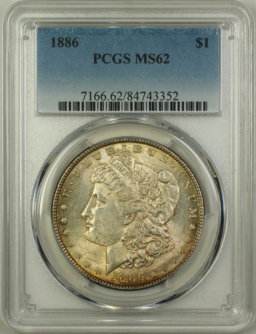 PCGS MS62 1886 Morgan Dollar Silver Coin Philadelphia Mint Toned: PCGS MS62 1886 Morgan Dollar Silver Coin Philadelphia Mint Toned This 1886 Morgan Silver Dollar is graded MS-62 by PCGS and features attractive toning. Minted in Philadelphia, this uncirculated coin i