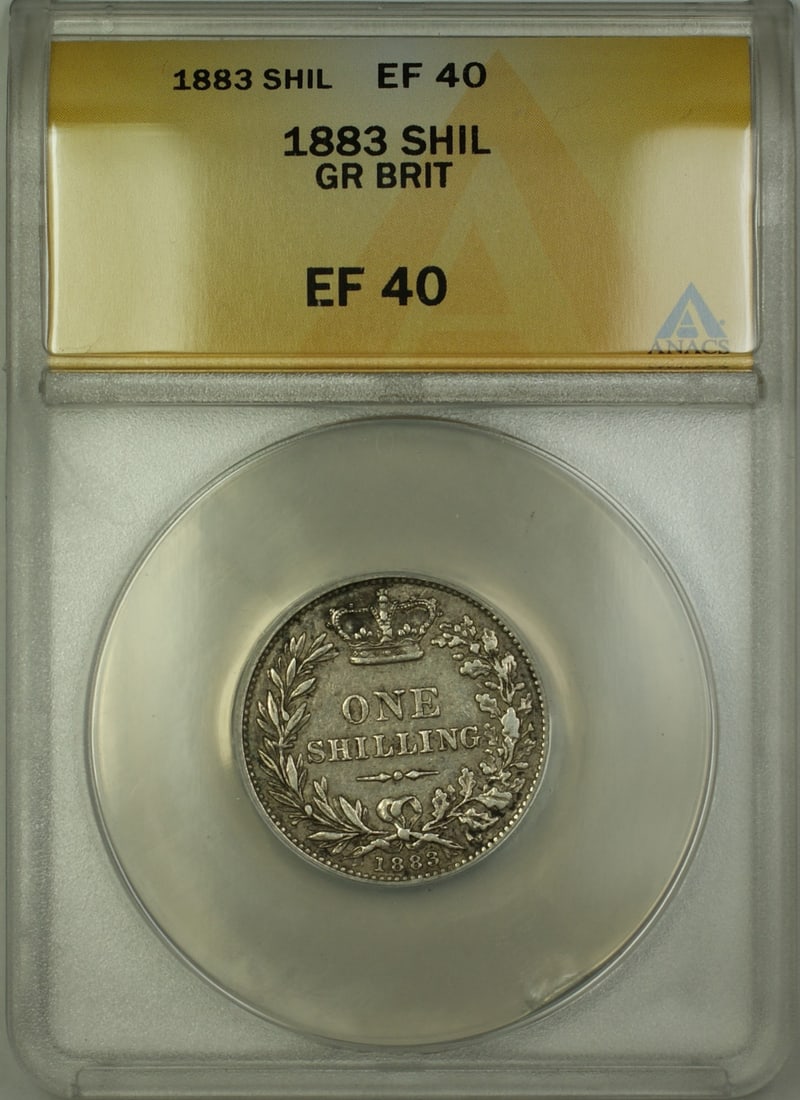 ANACS EF 40 Certified 1883 United Kingdom Silver Shilling Coin: ANACS EF 40 Certified 1883 United Kingdom Silver Shilling Coin This 1883 Great Britain shilling coin is composed of silver and has been graded EF-40 by ANACS. It is a circulated coin from the United K