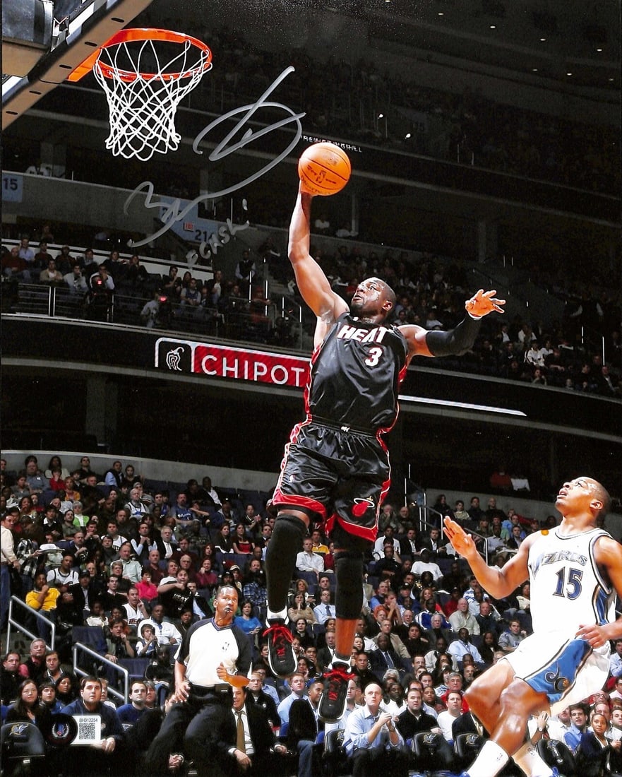Dwyane Wade Signed 11x14 Photo Inscribed Flash Beckett Certified: Dwyane Wade Signed 11x14 Photo Inscribed Flash Beckett Certified This impressive 11x14 photograph features Dwyane Wade, a renowned player of the Miami Heat, signed and inscribed in silver permanent ma