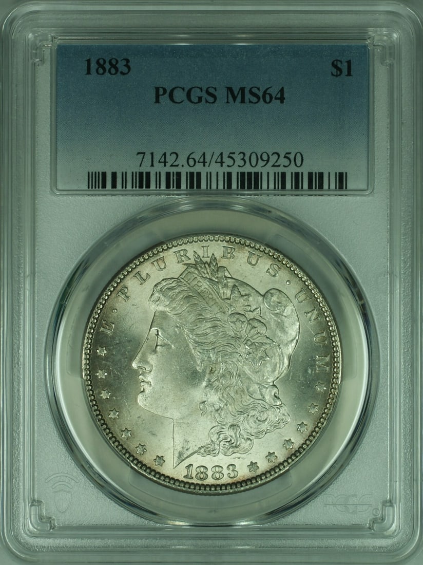 PCGS MS 64 1883 Morgan Dollar Silver Coin Philadelphia Mint: PCGS MS 64 1883 Morgan Dollar Silver Coin Philadelphia Mint This is an 1883 Morgan Silver Dollar graded MS-64 by PCGS. Minted in Philadelphia, this uncirculated coin is composed of silver and has a de