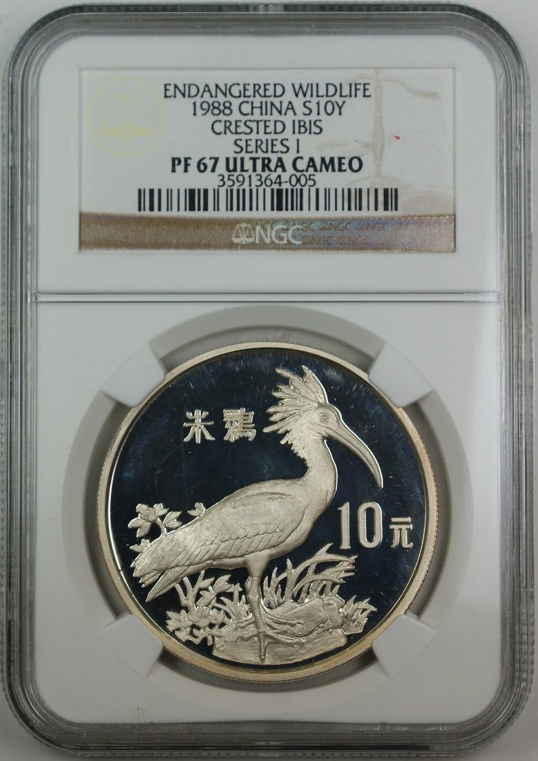 Crested Ibis Silver 10 Yuan 1988 NGC PF-67 Endangered Wildlife Coin: Crested Ibis Silver 10 Yuan 1988 NGC PF-67 Endangered Wildlife Coin This is a 1988 China Silver 10 Yuan proof commemorative coin from the Crested Ibis Endangered Wildlife Series. The coin is certified