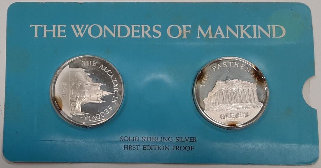 Pair of 1972 Silver Wonders of Mankind Medals Spain and Greece Theme: Pair of 1972 Silver Wonders of Mankind Medals Spain and Greece Theme This 1972 Franklin Mint set includes two uncirculated silver medals commemorating great works of art from around the world. Each me