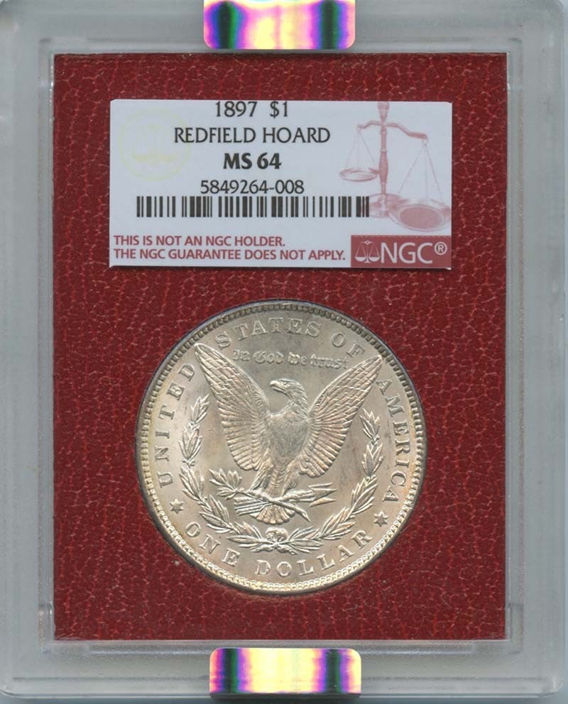1897 Morgan Dollar NGC MS63 Redfield Hoard Philadelphia: 1897 Morgan Dollar NGC MS63 Redfield Hoard Philadelphia This 1897 Morgan Dollar is certified by NGC with a grade of MS63, indicating it is in uncirculated condition. Minted in Philadelphia, this coin