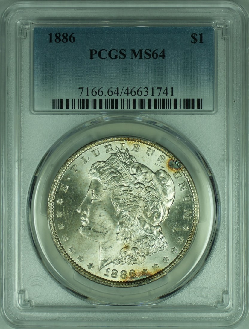 PCGS MS-64 Certified 1886 Philadelphia Morgan Silver Dollar $1 Coin: PCGS MS-64 Certified 1886 Philadelphia Morgan Silver Dollar $1 Coin This 1886 Morgan Silver Dollar is graded MS-64 by PCGS and features a composition of 90% silver. Minted in Philadelphia, it is an un