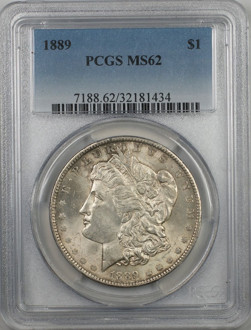 PCGS MS62 1889 Silver Morgan Dollar with Light Toning Uncirculated: PCGS MS62 1889 Silver Morgan Dollar with Light Toning Uncirculated This 1889 Morgan Silver Dollar features light toning and has been graded MS-62 by PCGS. Struck in Philadelphia, it is composed of sil
