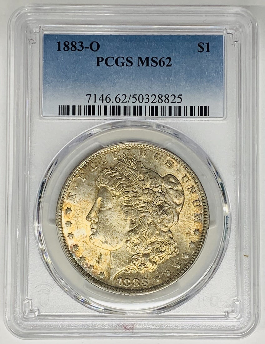 PCGS MS62 1883-O Morgan Silver Dollar with Colorful Toning: PCGS MS62 1883-O Morgan Silver Dollar with Colorful Toning This is an 1883-O Morgan Silver Dollar coin from the United States, featuring attractive toning. It is composed of silver and has a denominat