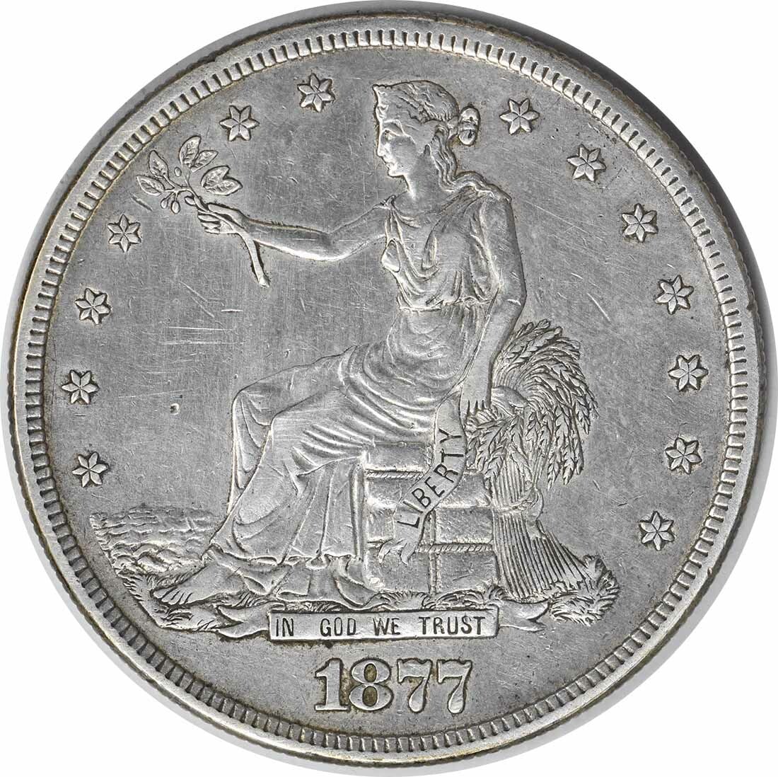 1877-S Trade Silver Dollar 90% Silver Uncertified Coin by William Barber: 1877-S Trade Silver Dollar 90% Silver Uncertified Coin by William Barber This 1877-S Trade Silver Dollar is a remarkable piece of numismatic history. Struck in San Francisco, this coin features a comp