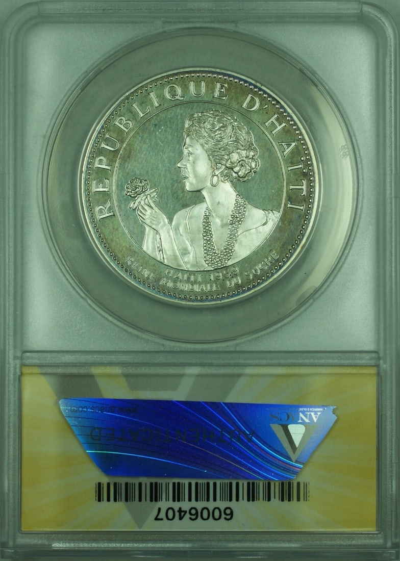 ANACS PR 63 1977 Haiti Silver 50 Gourdes Queen of Sugar Cane KM131 Coin: ANACS PR 63 1977 Haiti Silver 50 Gourdes Queen of Sugar Cane KM131 Coin This 1977 Haiti 50 Gourdes silver coin, titled 'Queen of Sugar Cane,' is graded ANACS PF 63 and is uncirculated. Issued in 1977,