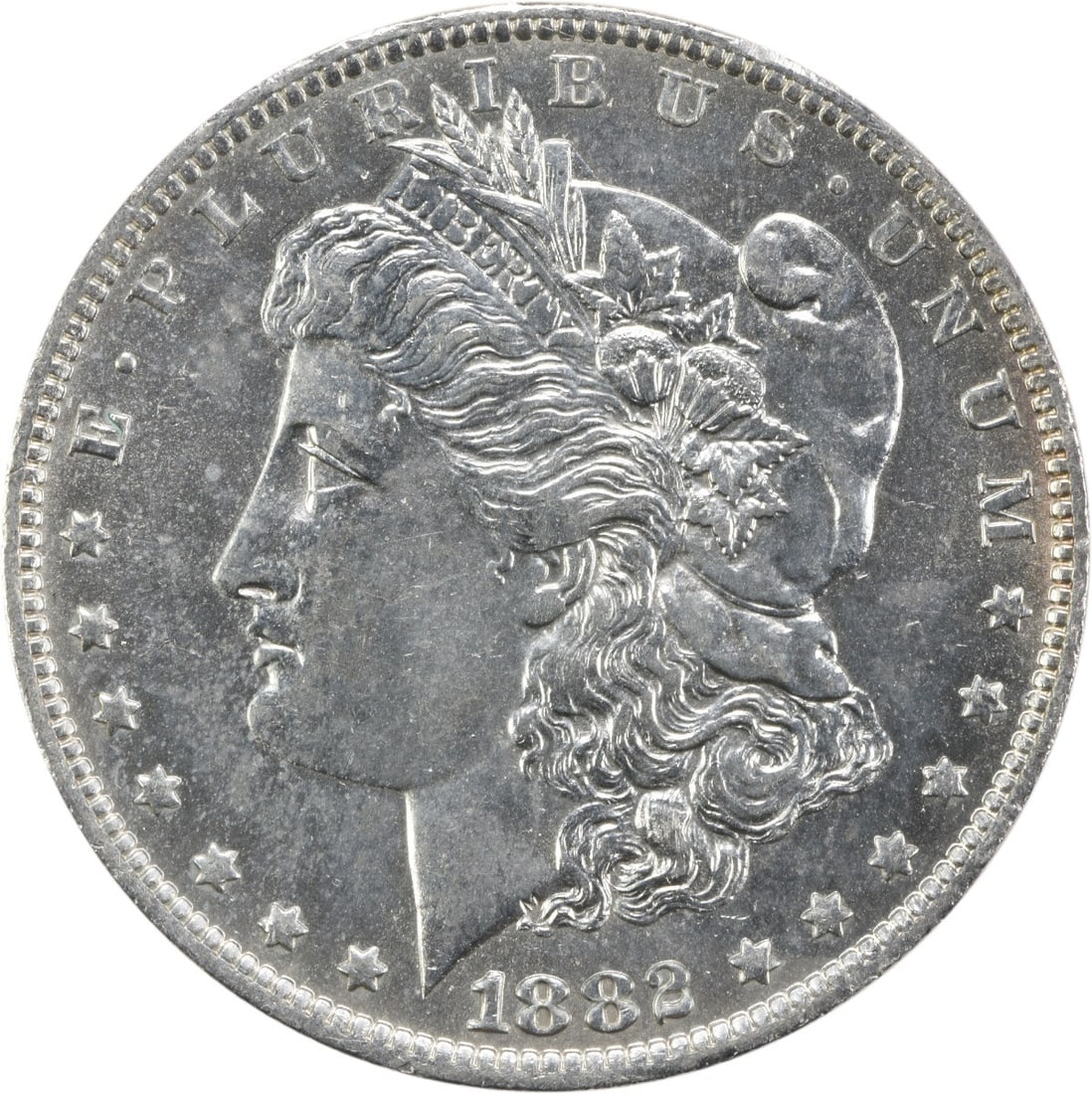 1882 New Orleans Morgan Dollar AU Grade 90 Percent Silver Uncertified: 1882 New Orleans Morgan Dollar AU Grade 90 Percent Silver Uncertified This 1882-O Morgan Silver Dollar is a circulated coin minted in New Orleans. Composed of 90% silver and 10% copper, it features th