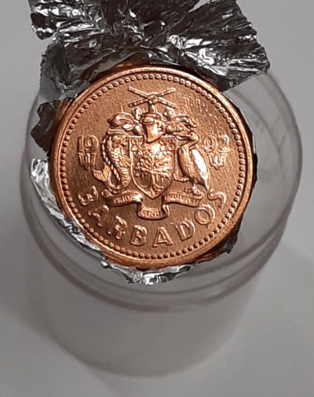 Roll of 48 Uncirculated 1992 Barbados Trident 1 Cent Coins KM 10a in Wrapper: Roll of 48 Uncirculated 1992 Barbados Trident 1 Cent Coins KM 10a in Wrapper This is a roll of 48 uncirculated 1992 Barbados 1 Cent coins featuring Queen Elizabeth II and the Trident design. Each coin