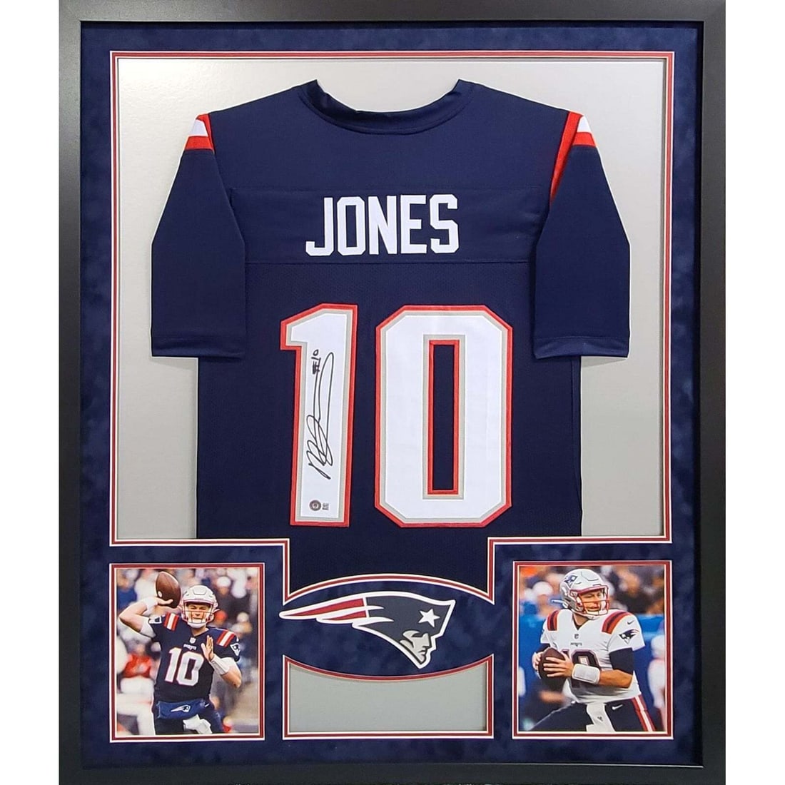 Mac Jones Autographed Framed Jersey New England Patriots Beckett Authenticated: Mac Jones Autographed Framed Jersey New England Patriots Beckett Authenticated This authentic Mac Jones signed framed jersey is a must-have for any New England Patriots fan. The jersey is professional