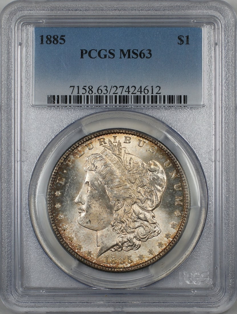 PCGS MS63 1885 Silver Morgan Dollar with Toned Finish: PCGS MS63 1885 Silver Morgan Dollar with Toned Finish This is an 1885 Morgan Silver Dollar $1 coin from the United States, certified by PCGS with a grade of MS 63. The coin is uncirculated, minted in