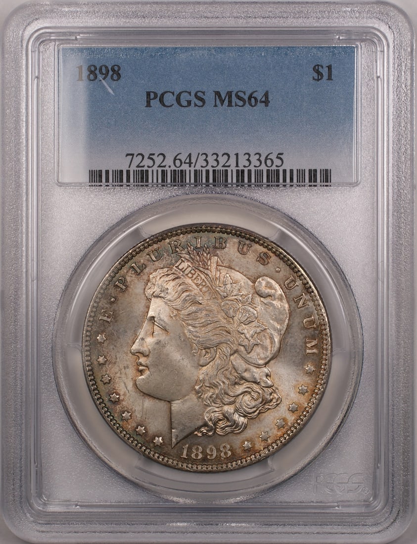 PCGS MS64 1898 Silver Morgan Dollar Toned Philadelphia Mint: PCGS MS64 1898 Silver Morgan Dollar Toned Philadelphia Mint This 1898 Morgan Silver Dollar is certified by PCGS with a grade of MS 64. The coin is uncirculated and features attractive toning. Minted i