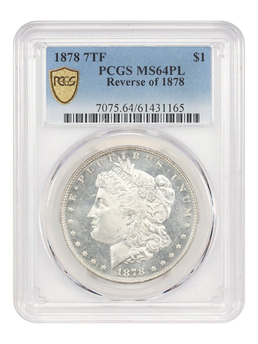 PCGS MS64PL 1878 Morgan Dollar 7 Tail Feathers Reverse of 1878: PCGS MS64PL 1878 Morgan Dollar 7 Tail Feathers Reverse of 1878 This is an 1878 Morgan Dollar, featuring the 7 Tail Feathers reverse design of 1878. The coin has been certified by PCGS with a MS64PL gr