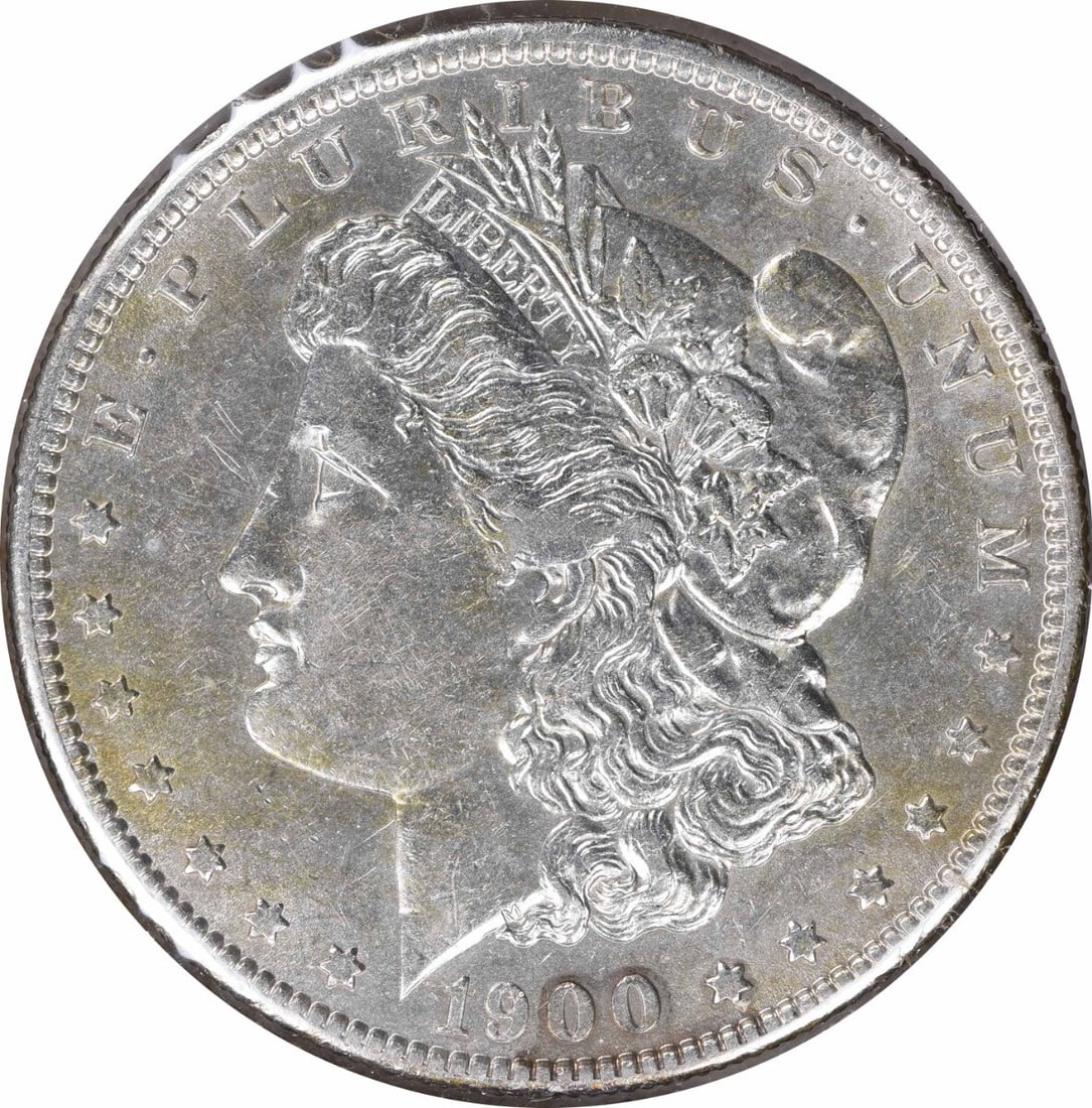 1900-O Morgan Silver Dollar AU Uncertified 90% Silver Coin: 1900-O Morgan Silver Dollar AU Uncertified 90% Silver Coin This 1900-O/CC Morgan Silver Dollar showcases a stunning design by George T. Morgan, representing a significant piece of American numismatic