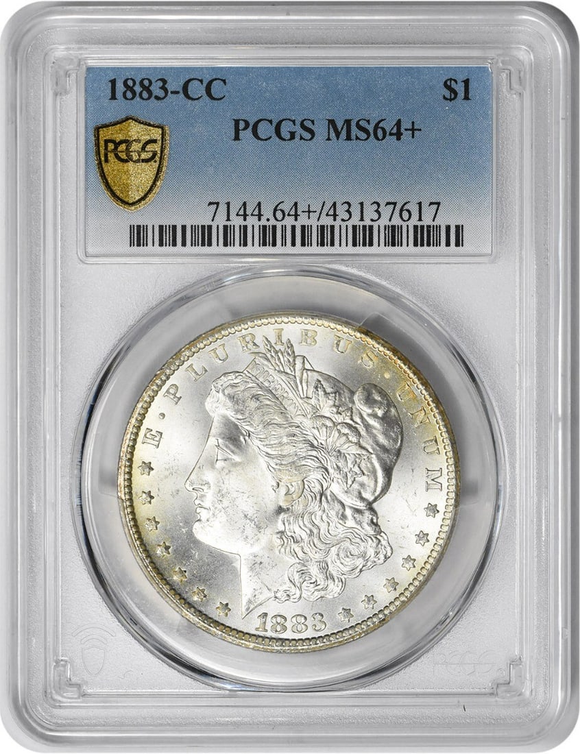 PCGS MS64 Plus 1883 Carson City Morgan Dollar Silver Coin: PCGS MS64 Plus 1883 Carson City Morgan Dollar Silver Coin This is an 1883-CC Morgan Silver Dollar graded MS64+ by PCGS. Minted at the Carson City Mint, this uncirculated coin is composed of 90% silver