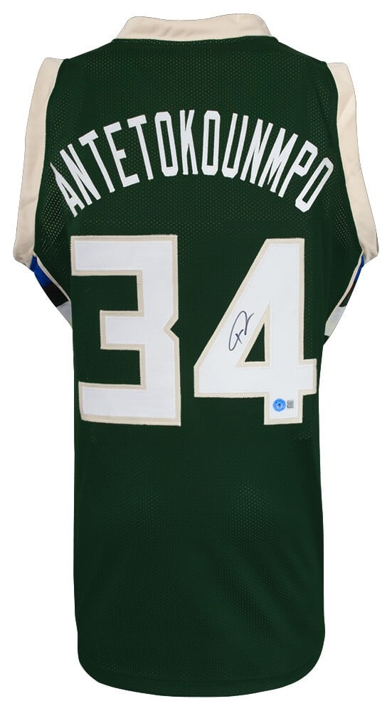 Green Custom Basketball Jersey Signed by Giannis Antetokounmpo Beckett Authenticated: Green Custom Basketball Jersey Signed by Giannis Antetokounmpo Beckett Authenticated This is a green custom basketball jersey signed by Giannis Antetokounmpo of the Milwaukee Bucks. The autograph is a