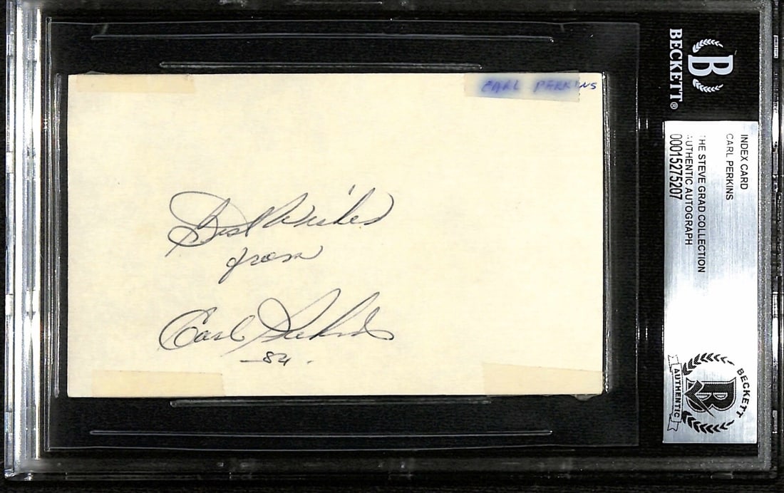 Autographed 3x5 Index Card Signed by Carl Perkins with Beckett Authentication: Autographed 3x5 Index Card Signed by Carl Perkins with Beckett Authentication This is a pre-owned 3x5 index card featuring the autograph of legendary musician and guitarist Carl Perkins. Signed in bla