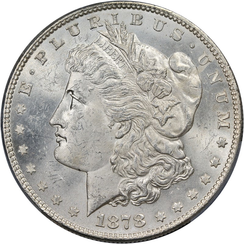 1878-P Morgan Silver Dollar PCGS MS63 Blast White Great Luster: 1878-P Morgan Silver Dollar PCGS MS63 Blast White Great Luster This original 1878-P 7TF Rev 78 Morgan Silver Dollar showcases exceptional eye appeal with its fantastic luster and strong strike. The co