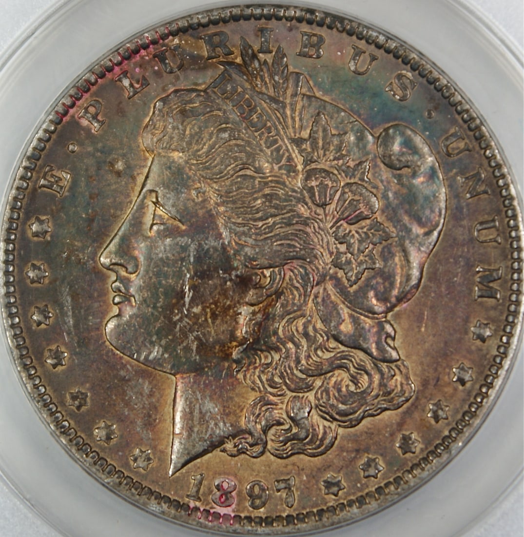 ANACS AU-58 1897-O Morgan Dollar Silver Coin Cleaned and Toned New Orleans Mint: ANACS AU-58 1897-O Morgan Dollar Silver Coin Cleaned and Toned New Orleans Mint This 1897-O Morgan Silver Dollar is a circulated coin from the New Orleans Mint, certified by ANACS with an AU-58 Detail