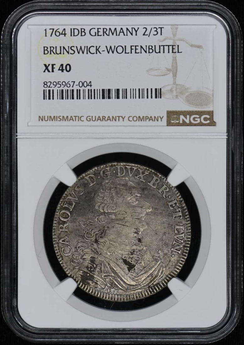 Silver 1764 Brunswick Wolfenbuttel 2/3 Taler NGC XF40 Certified Coin: Silver 1764 Brunswick Wolfenbuttel 2/3 Taler NGC XF40 Certified Coin This 1764 Brunswick-Wolfenbuttel 2/3 Taler coin from Germany is composed of silver and has been graded XF40 by NGC. The coin is in