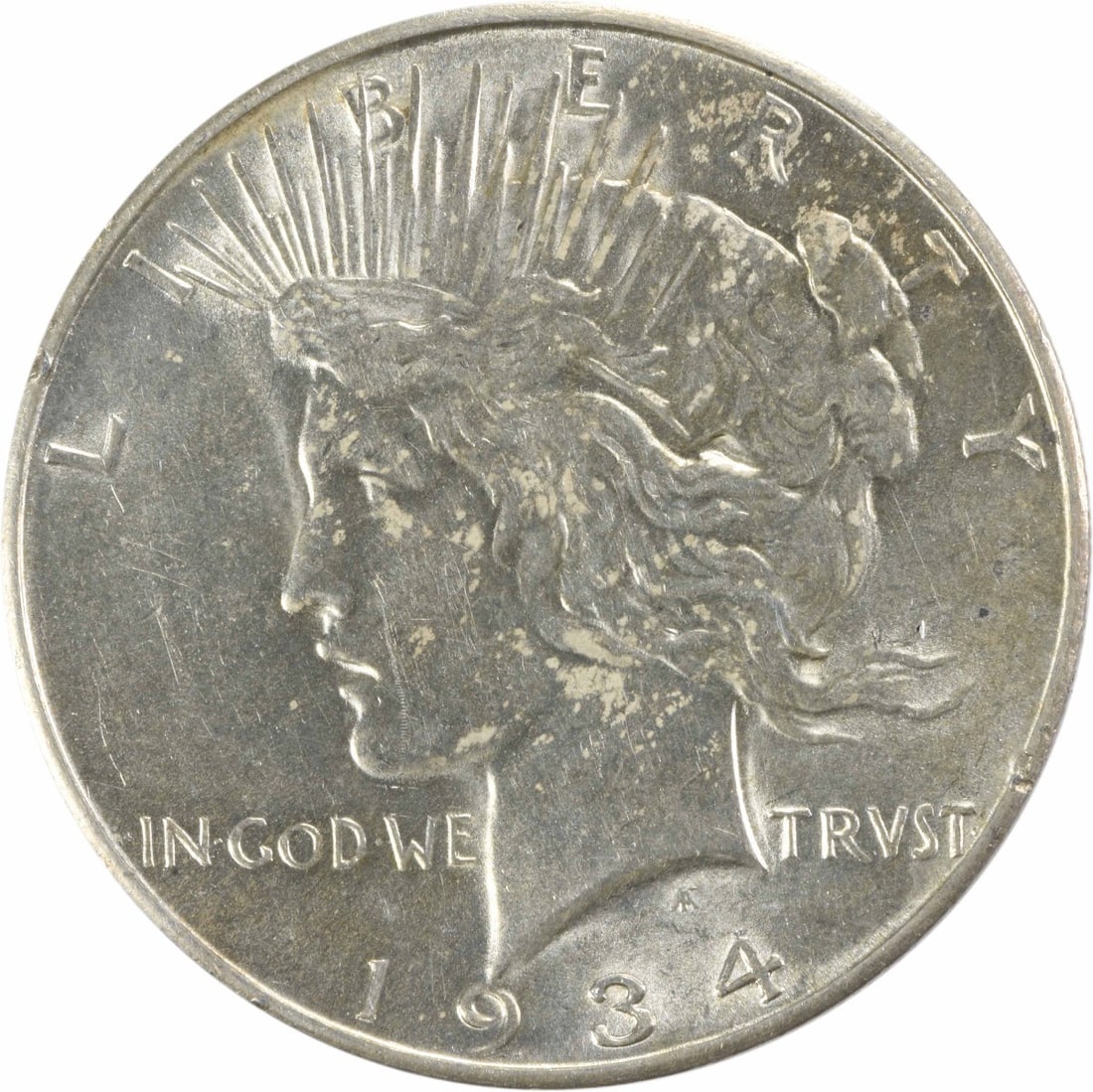1934-D Peace Silver Dollar AU Uncertified 90% Silver Coin: 1934-D Peace Silver Dollar AU Uncertified 90% Silver Coin This 1934-D Peace Silver Dollar is an impressive collectible coin featuring a design by Anthony de Francisci. With a composition of 90% silver