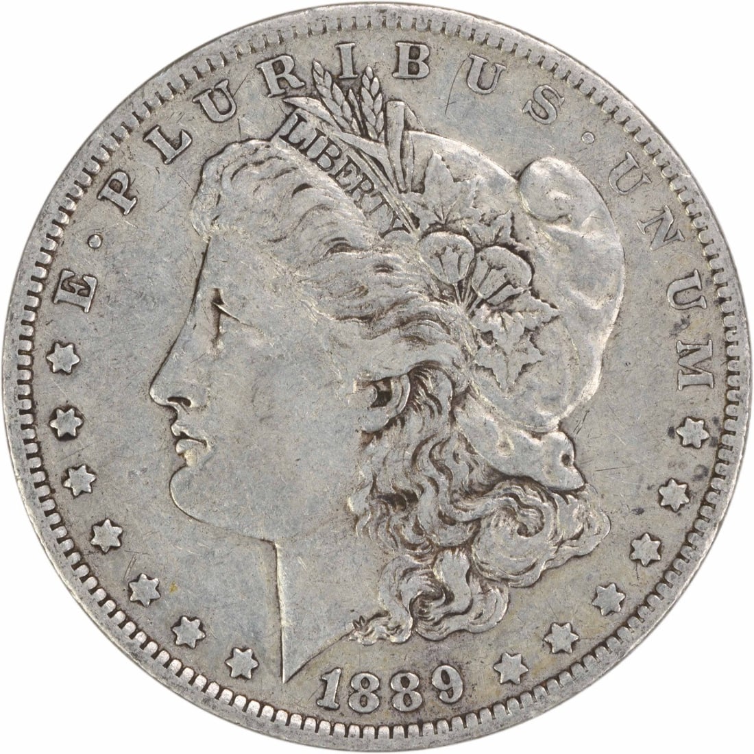 EF Grade 1889 New Orleans Morgan Dollar Uncertified Silver Coin: EF Grade 1889 New Orleans Morgan Dollar Uncertified Silver Coin This 1889-O Morgan Silver Dollar is an uncertified, circulated coin from the New Orleans Mint. Struck in 90% silver and 10% copper, it f