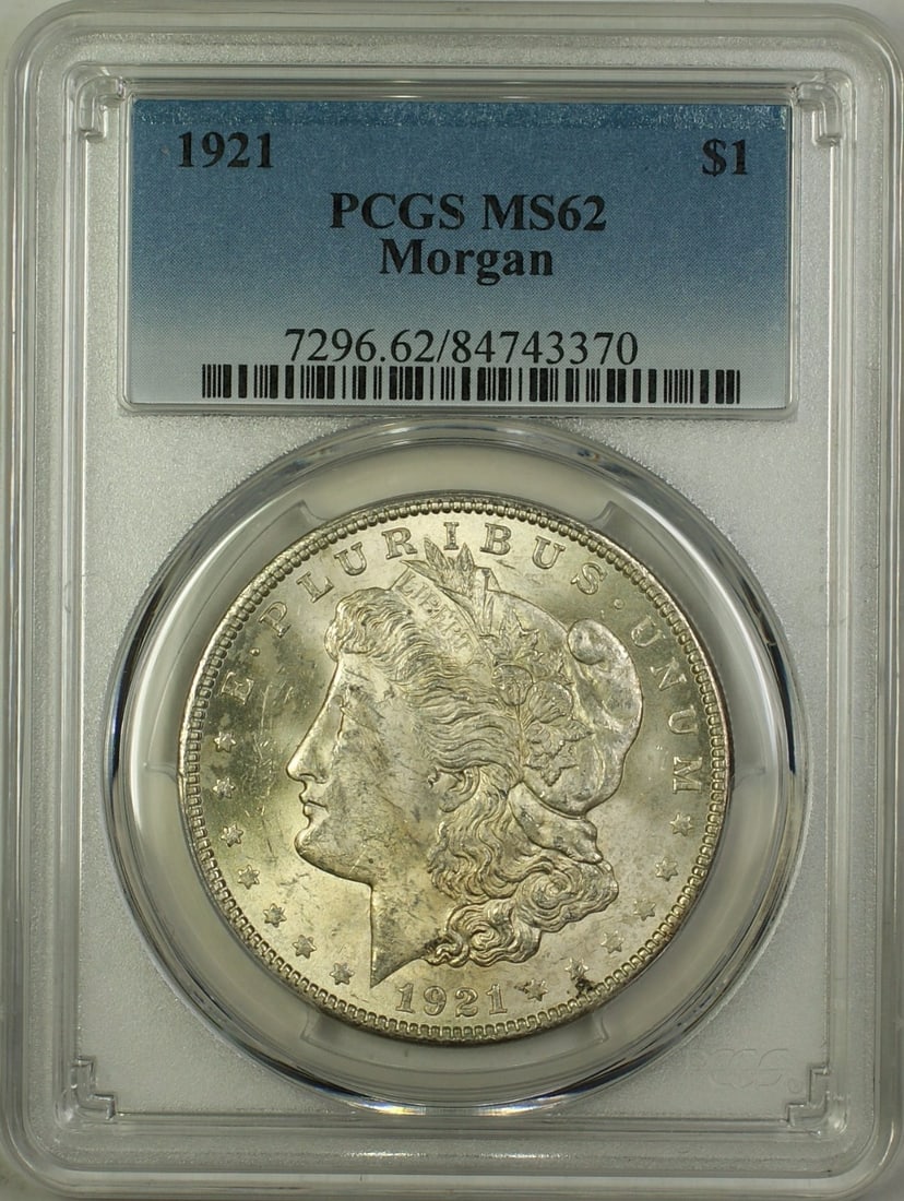 PCGS MS62 1921 Morgan Dollar Silver Philadelphia Mint Uncirculated $1 Coin: PCGS MS62 1921 Morgan Dollar Silver Philadelphia Mint Uncirculated $1 Coin This 1921 Morgan Silver Dollar is a $1 coin graded MS-62 by PCGS. Minted in Philadelphia, it is composed of silver and remain