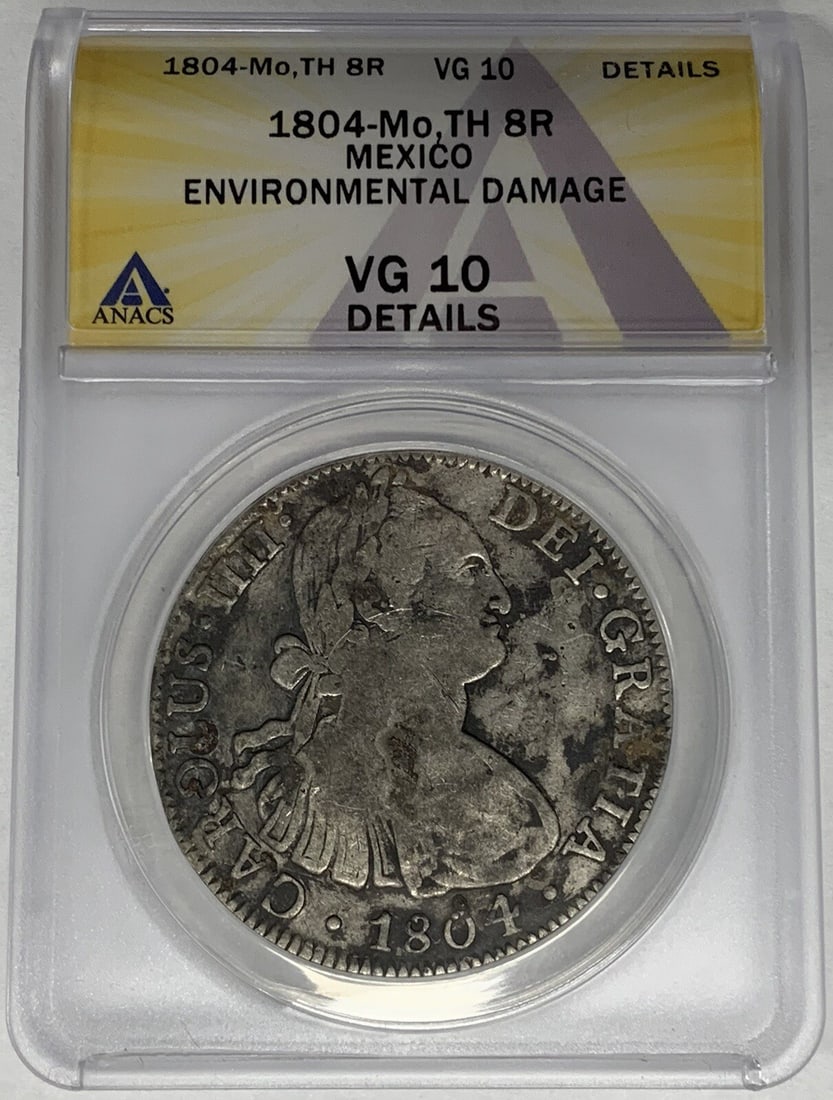 Mexico 1804 Silver 8 Reales Coin ANACS Certified VG 10: Mexico 1804 Silver 8 Reales Coin ANACS Certified VG 10 This 1804-Mo, TH 8 Reales coin from Mexico was minted during the Colonial period and is composed of silver. The coin has been graded VG 10 by ANA