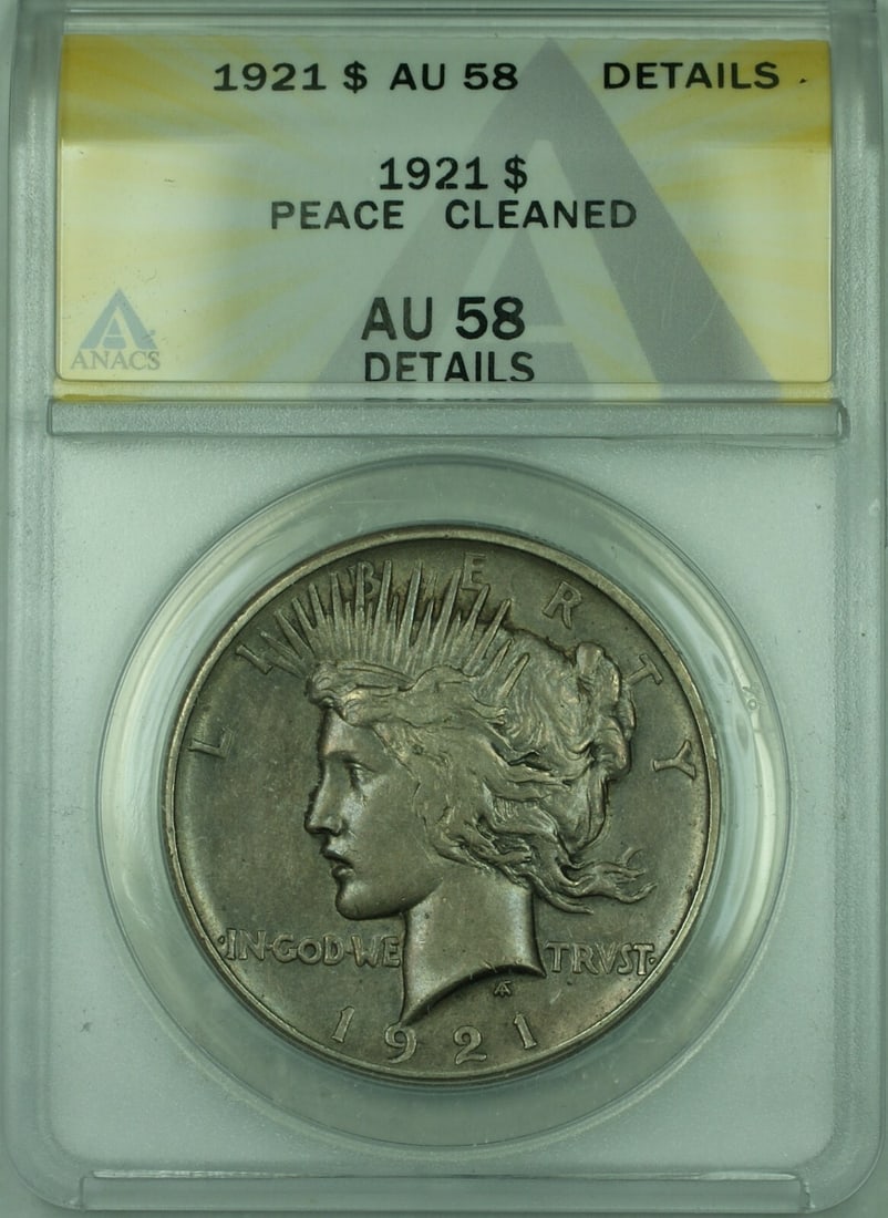 1921 ANACS AU-58 Peace Dollar Silver Coin Cleaned Philadelphia Issue: 1921 ANACS AU-58 Peace Dollar Silver Coin Cleaned Philadelphia Issue This is a 1921 Peace Silver Dollar $1 coin graded AU-58 Details Cleaned by ANACS. Minted in Philadelphia, this circulated coin is c
