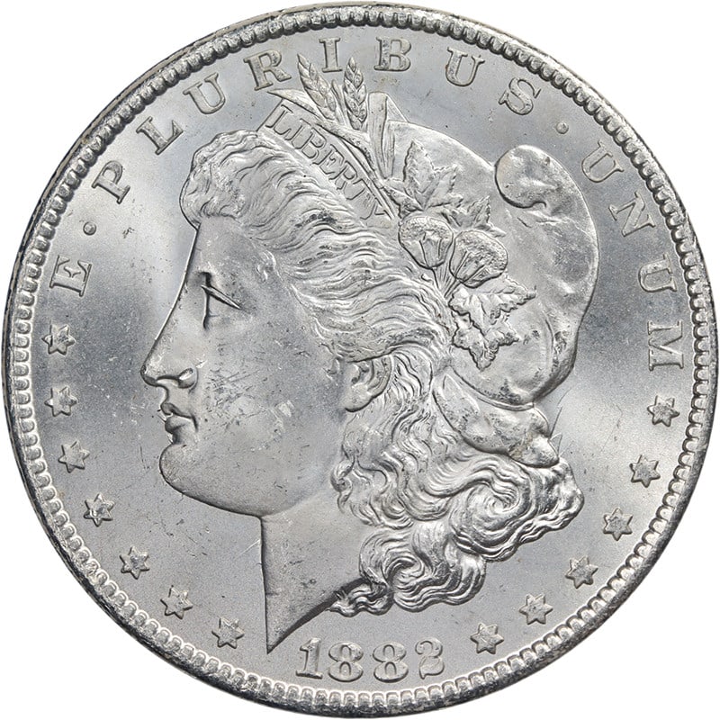 1882-CC GSA Morgan Silver Dollar NGC MS63 Blast White: 1882-CC GSA Morgan Silver Dollar NGC MS63 Blast White This stunning 1882-CC GSA Morgan Silver Dollar is a collector's treasure, showcasing great eye appeal with its fantastic luster and strong strike.