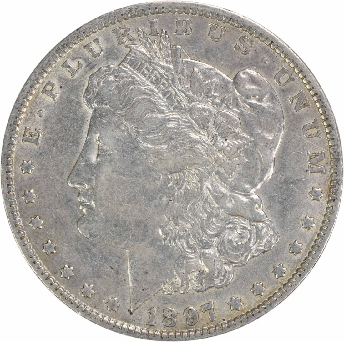 1897 O Morgan Silver Dollar EF Uncertified 90% Silver Coin: 1897 O Morgan Silver Dollar EF Uncertified 90% Silver Coin This 1897-O Morgan Silver Dollar is a classic piece of American coinage, featuring a beautiful design by George T. Morgan. The coin is compos