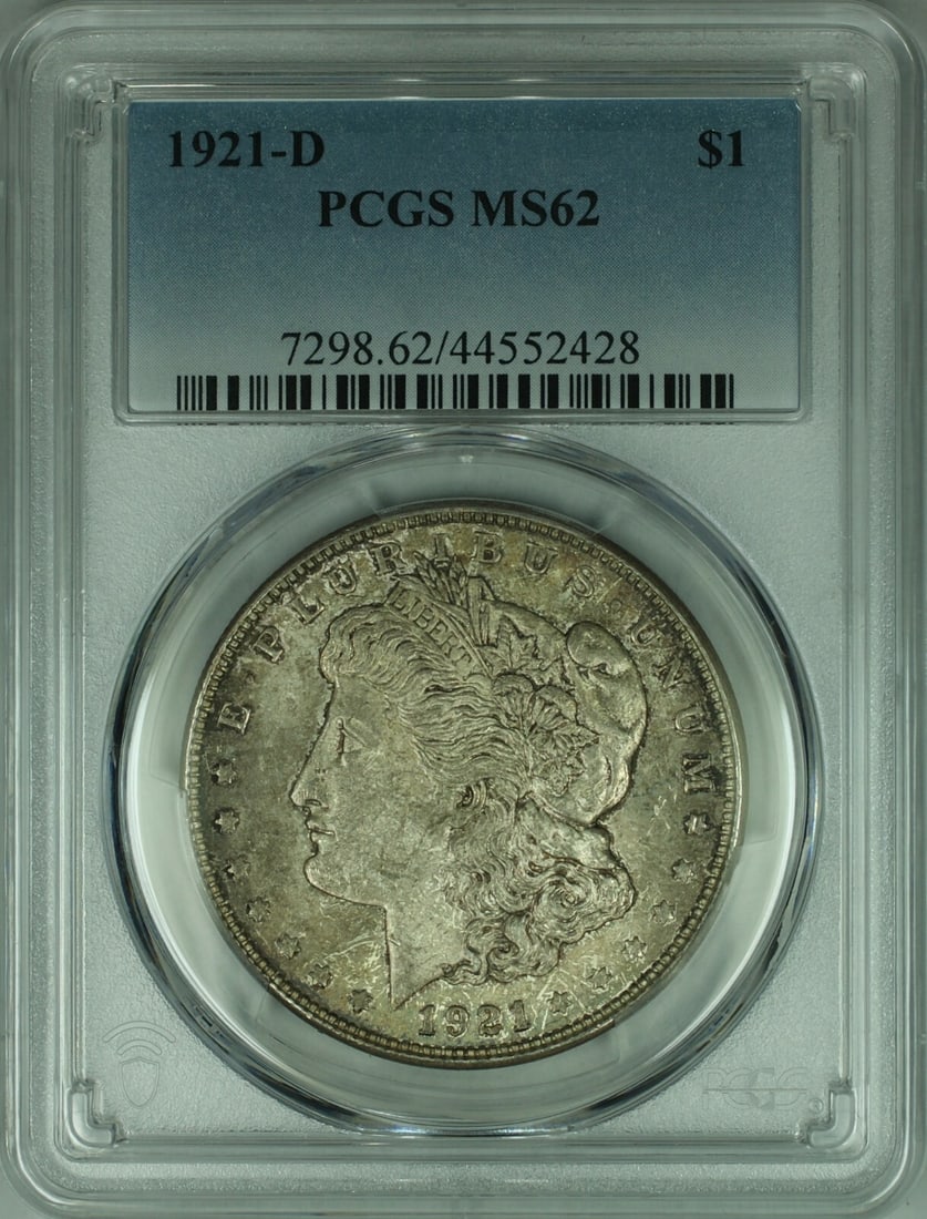 PCGS MS-62 1921-D Morgan Silver Dollar with Toning Uncirculated $1 Coin: PCGS MS-62 1921-D Morgan Silver Dollar with Toning Uncirculated $1 Coin This is a 1921-D Morgan Silver Dollar coin graded MS-62 by PCGS. The coin was minted in Denver and is composed of silver. It fea